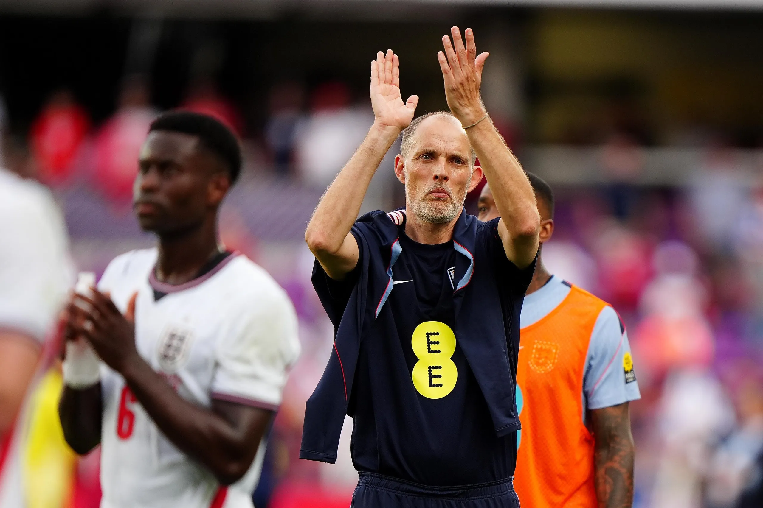 England head coach Thomas Tuchel applauds supporters
