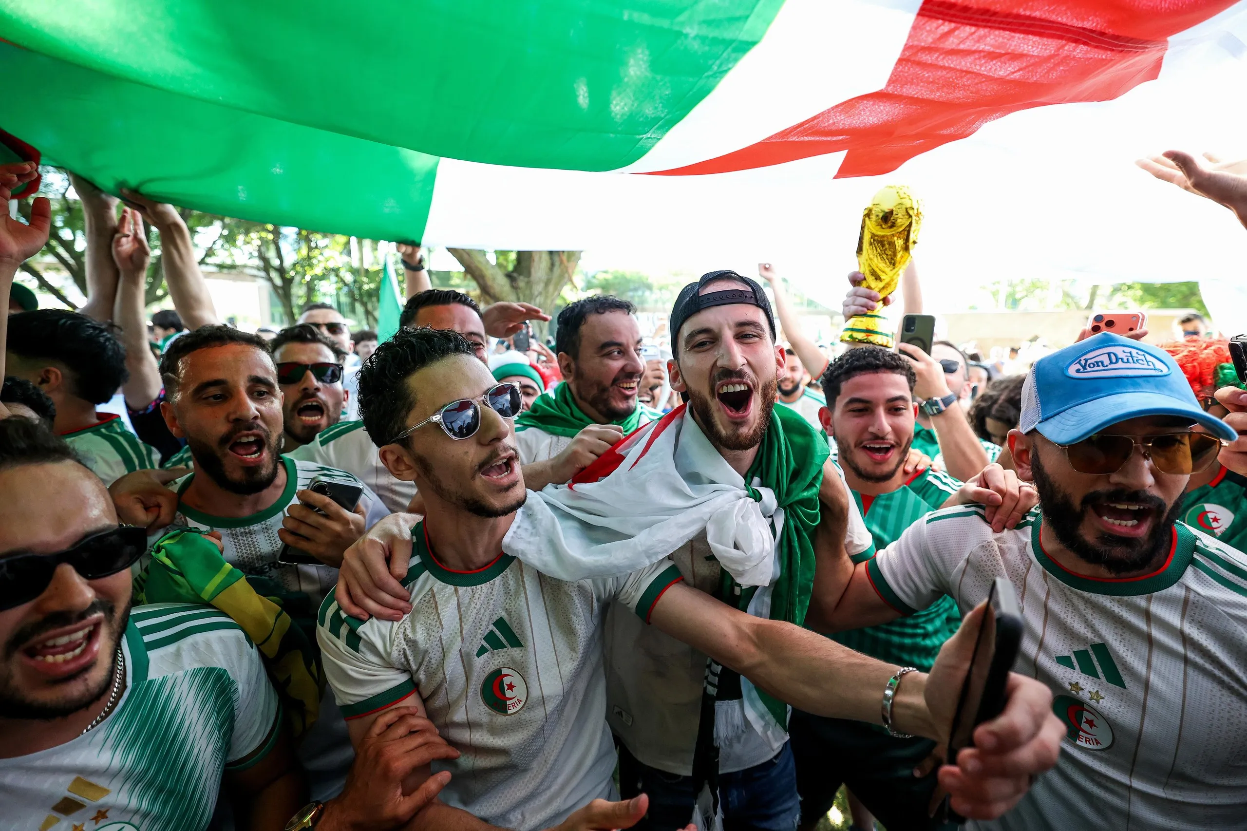 Algerian fans gather near the National WWI Museum and Memorial ahead of the Group J match between Argentina and Algeria in Kansas City, Missouri
